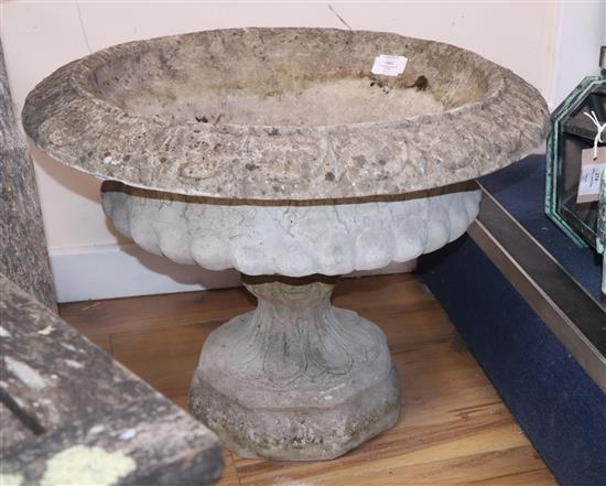 A reconstituted garden urn on stand Diameter 62cm